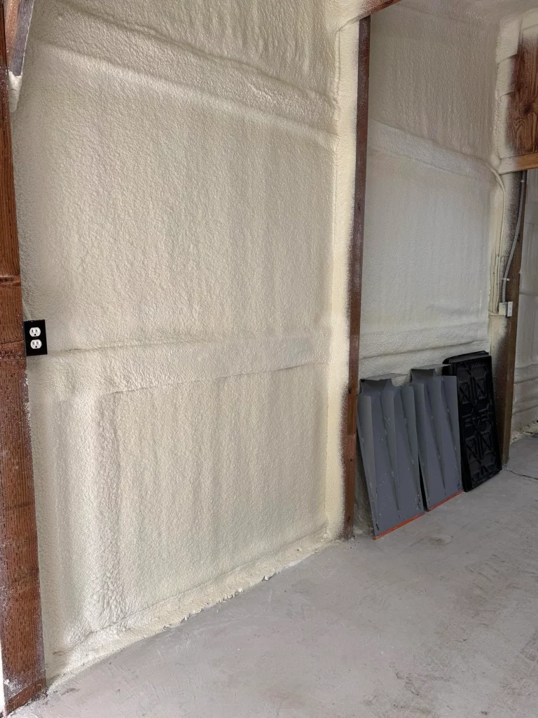 Why is closed-cell spray foam insulation less likely to absorb odors than cellulose